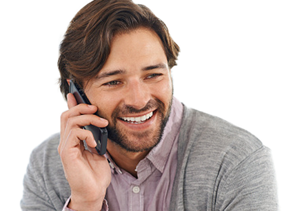 A picture of a man on a phone.